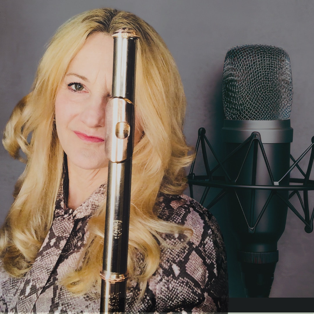 Amy Porter with flute and microphone